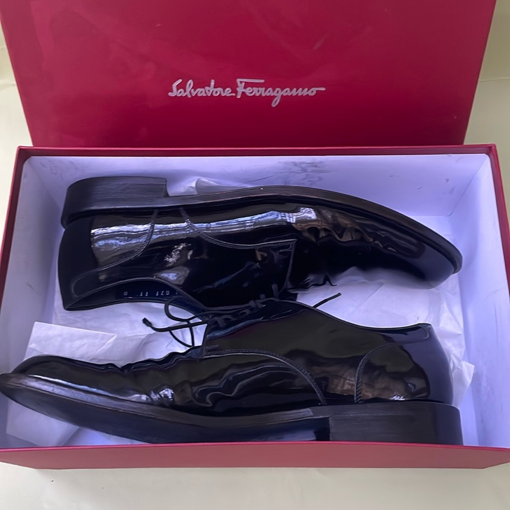 Dark blue Salvatore Ferragamo patent leather shoes in box